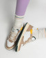 Oncept Women's Phoenix Sneakers in Oak Multi worn on foot