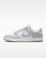 The Nike Men's Dunk Low Retro Shoes in White and Light Smoke Grey