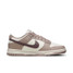 The Nike Women's Dunk Low Retro Shoes in The Sail and Plum Colorway