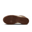 The Nike Women's Dunk Low Retro Shoes in White and Brown