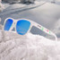 goodr OG Christmas Sunglasses White and Blue angle view