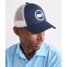 The Vineyard Vines Whale Dot Performance Trucker Hat in Blue Blaze