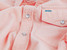 The Criquet Men's Corduroy Pearl Snap Short Sleeve Shirt in Peach Pink
