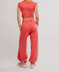 FP Movement Women's Hot Shot Crossover Set in Grapefruit back view