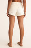 Z Supply Women's Classic Hi Rise Denim Shorts in Off White back view