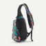 Patagonia Atom 8L Sling Bag in black, angled back view