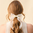 The Darling Effect Sheer Pearl Hair Bow in Cream detail