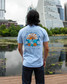 TYLER'S Flatwater Dam That Cancer 2025 Giveback Tee in gray, angled view