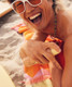 Sun Bum Original SPF 50 Sunscreen Spray side angle