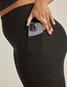 Beyond Yoga Women's Spacedye Out Of Pocket High Waisted Midi Legging in Darkest Night back view