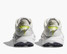 The Hoka Women's Challenger 8 Trail Running Shoes in White and Citrus