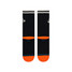 The Medium cushioning for balanced comfort in Black and Orange