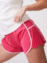 Thrive Societe Women's Pleated Side Run Short in Solar Pink side view