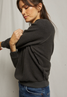 perfectwhitetee Women's Ziggy Inside Out Fleece Crew Pullover in Vintage Black detail view
