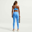 Nike Women's Indy Light Sports Bra in University Blue front view