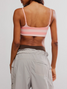 FP Movement Women's Tighten Up Reversible Bra in Fruit Punch front view