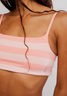 FP Movement Women's Tighten Up Reversible Bra in Fruit Punch back view