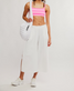 FP Movement Women's Tighten Up Reversible Bra in Hot Pink Combo full view