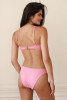 Dippin Daisys Women's Pink Zen Bikini Top in pink, front view