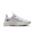 Nike Women's Free Metcon 7 Workout Shoes in White and Metallic Silver three-quarter view