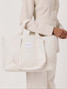 augustnoa The Everyday Tote in Natural handles detail