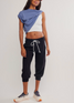 FP Movement Women's Flutter Cropped Joggers in Black front view