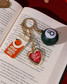 ban.do Orange Juice Fidget Keychain orange juice carton front view