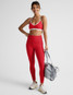Beyond Yoga Women's Spacedye Strappy Sports Bra in Chili Red Heather back view