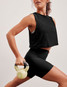 Beyond Yoga Women's Featherweight Minimal Crop Top in Darkest Night front