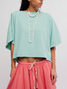 Free People Women's Next Level Tee in Wasabi Sauce flat lay