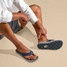 Olukai Ulele Sandals Blue Depth and Charcoal side view