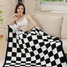 Checkered Reversible Throw Blanket in Black and White folded detail