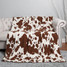 Cow Print Throw Blanket in Brown and White corner detail