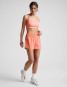 Beyond Yoga Women's Solemate 2.5" Shorts in dreamsicle, angled view.