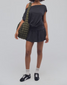 FP Movement Women's Hot Shot City Dress in black, angled view