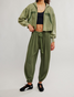 FP Movement Women's Momentum Pants in ivy green, full view angle