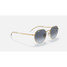 Ray-Ban Jack Sunglasses in gold frame with blue gradient lenses, tilted view.
