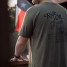 Texas Standard Men's Ride On Heritage Tee in natural tan color, angled view