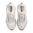 Nike Women's Vomero Plus Running Shoes Summit White Metallic Silver top view