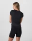 Vuori Women's Halo Baby Tee Solid Black back view