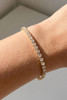 Fame Prong-Set Round Cubic Zirconia Tennis Bracelet in Gold full view