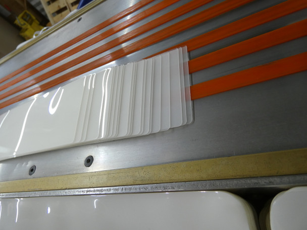 Prayer card pouches coming off our manufacturing line