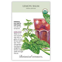 Botanical Interests Lemon Balm Seeds, packet showing illustration of lemon balm plant with leaves and flowers alongside a glass of iced lemon balm tea.