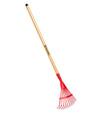 CORONA Kids Long Handle Tool, a long wooden handle with a red rake head for children.