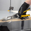 Malco AV33 Metal Aviation Snips in hand cutting sheet metal