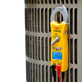 Fieldpiece SC260 Compact Clamp Meter with TRUE RMS hanging from magnet