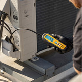 Fieldpiece DRX3 Refrigerant and Combustible Gas Leak Detector in use on rooftop unit
