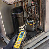 Fieldpiece DRX3 Refrigerant and Combustible Gas Leak Detector in use on rooftop unit