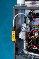 Fieldpiece JL3KMN Job Link Manometer hanging in use