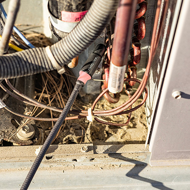 Fieldpiece DRX3 Refrigerant and Combustible Gas Leak Detector in use closeup of tip